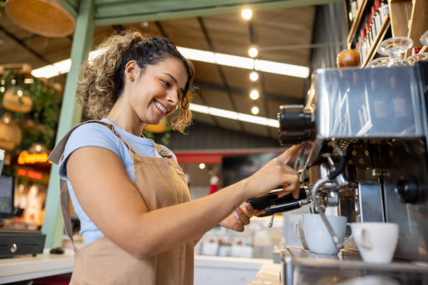 istock Barista making a cup of coffee at a cafe 2193767324