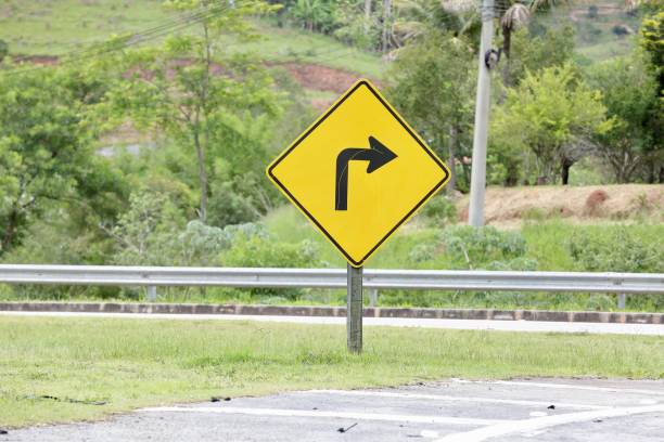 Left-hand traffic sign in yellow.