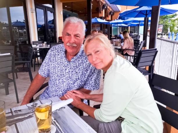 istock Happy couple at an outdoor restaurant 2193769095