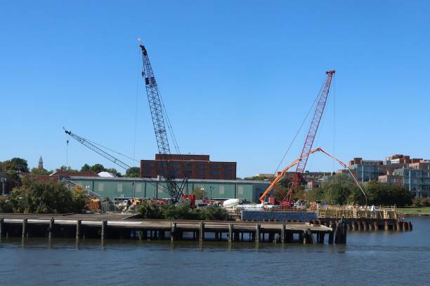 istock A Collection Of Cranes Working At Site On The Potomac River 2193772533