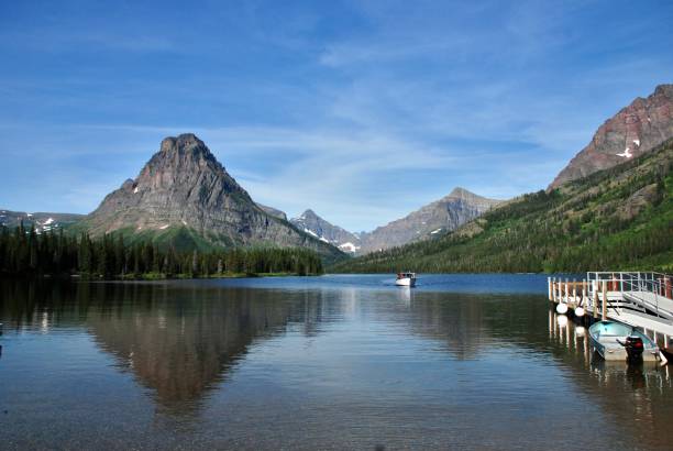 istock Mountain reflecting in a lake in Glacier National Park. 2193773826