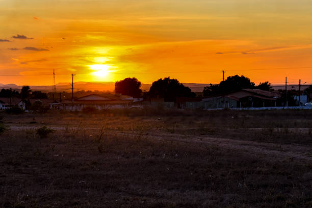 Sunset in the backlands of Northeast Brazil. sunset in the backlands of Northeast Brazil, in Piranhas, Alagoas. orange piranha stock pictures, royalty-free photos & images