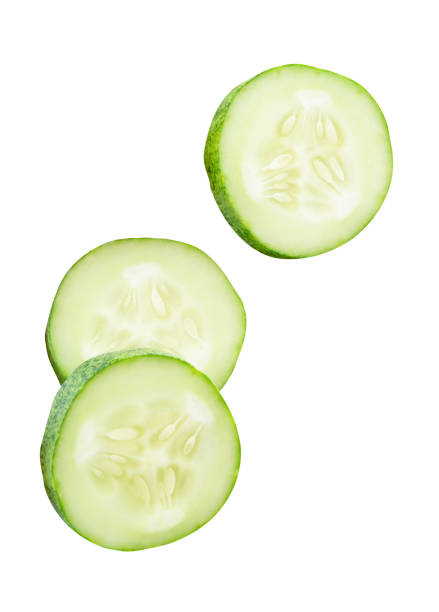 istock Top view set of fresh green cucumber slices in circle shape in stack isolated on white background with clipping path 2193775843