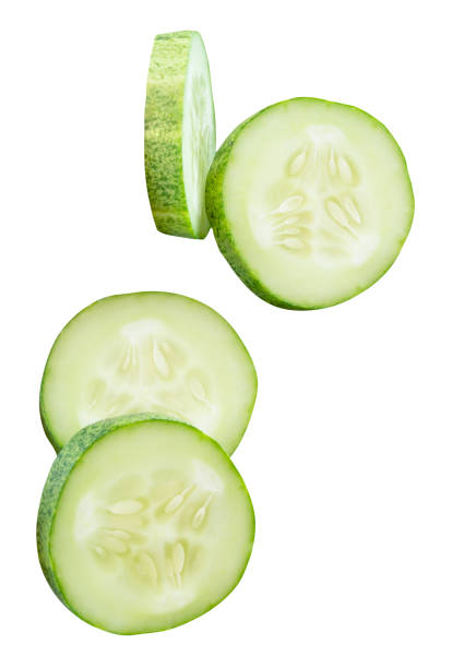 istock Top view set of fresh green cucumber slices in circle shape in stack isolated on white background with clipping path 2193775849