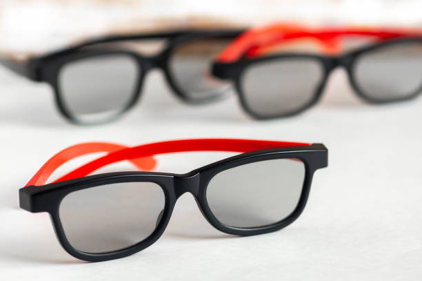 some 3d glasses for a movie theater on a light background