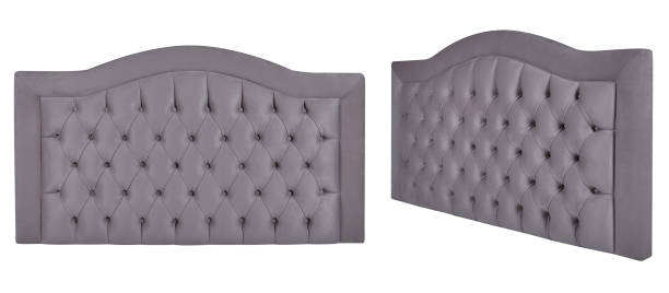 istock Elegant tufted upholstered headboard with nailhead trim in gray fabric. Isolated headboard 2193780187