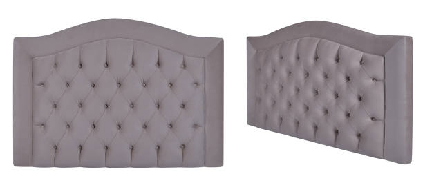 istock Elegant tufted upholstered headboard with nailhead trim in gray fabric. Isolated headboard 2193780189