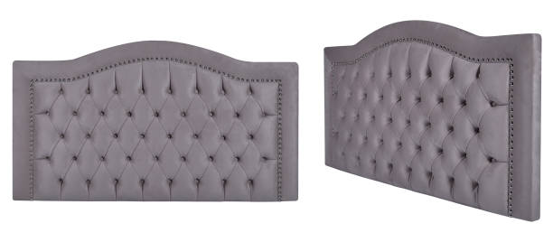 istock Elegant tufted upholstered headboard with nailhead trim in gray fabric. Isolated headboard 2193780325