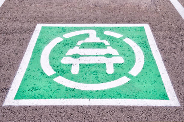 istock The symbol depicts a car with a plug, indicating that this is a parking space designated for electric vehicles. 2193781049
