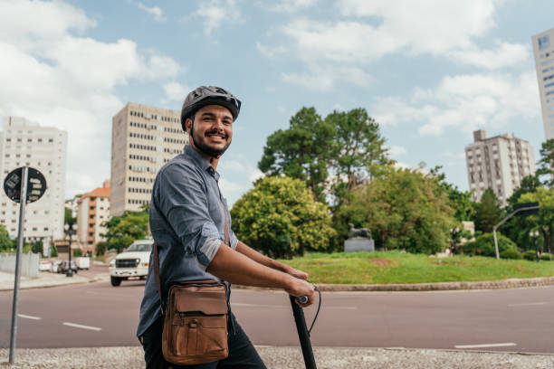 istock Portrait of worker using electric scooter in city 2193790310
