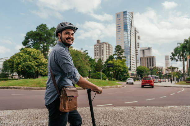 istock Portrait of worker using electric scooter in city 2193790319