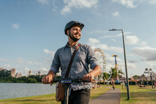 istock Portrait of worker using electric scooter in city 2193790370