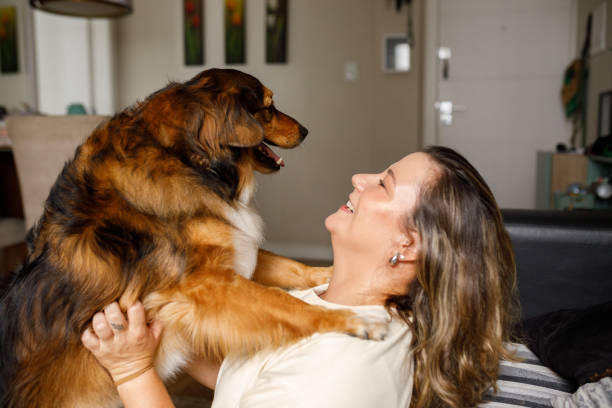 istock Dog hugging woman 2193791769