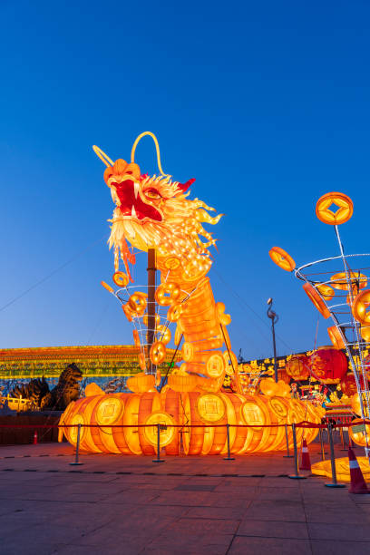 istock Chinese dragon-shaped lanterns at night 2193792779