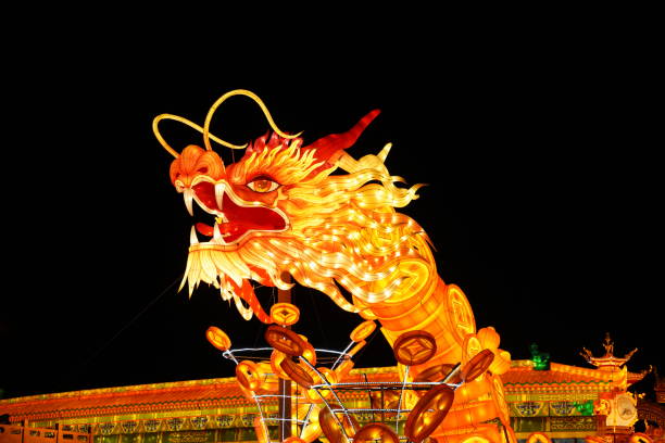 istock Chinese dragon-shaped lanterns at night 2193792780
