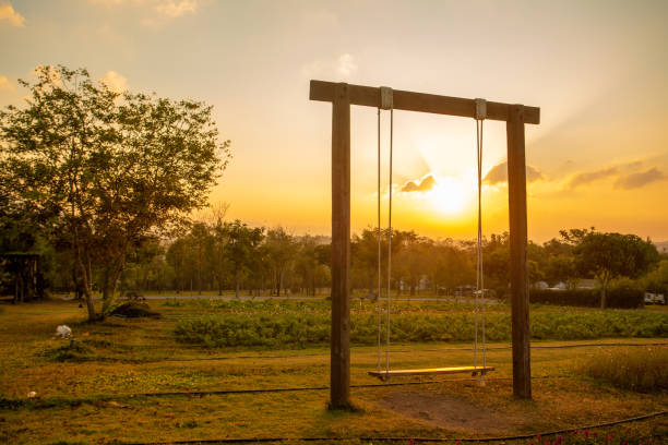 Swing in the flower garden