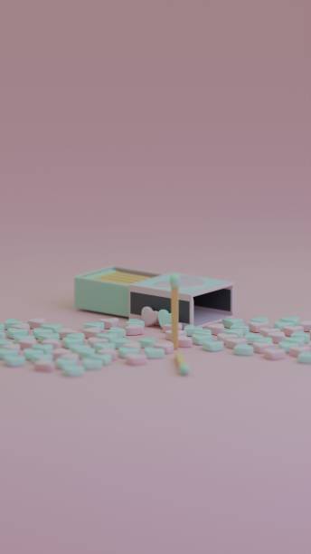 istock Open matchbox spilling heart-shaped candies and matches 2193797314