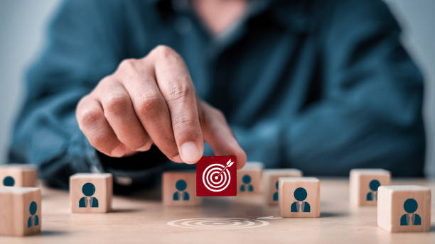 istock leader and followers pointing. human icon for customer focus target group and customer relation management concept. 2193798556