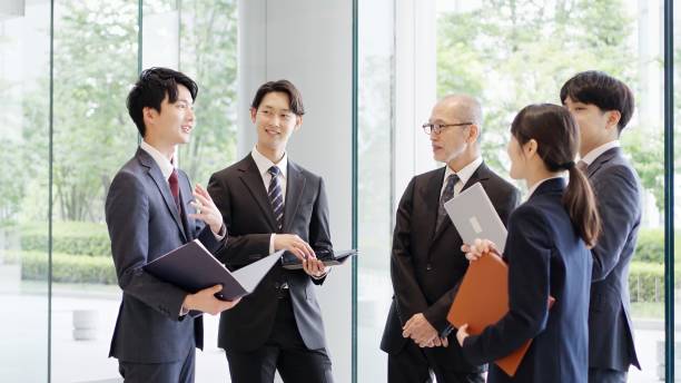istock Business people talking in the lobby 2193800658