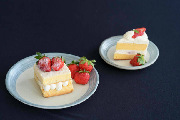 istock Japanese shortcake with strawberries on top is placed on a black cloth 2193803493