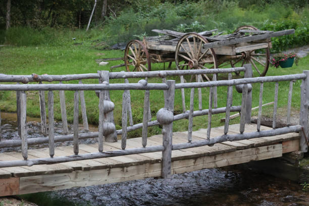 A small bridge over a river and wagon