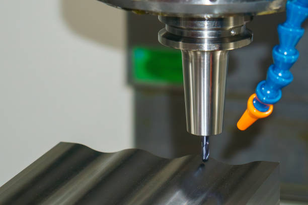 istock The CNC milling machine cutting  injection mold part by solid ball end mill tool. 2193806456
