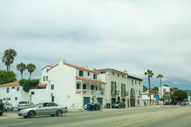 White residential buildings along Pacific Coast Highway on an overcast day in July 2016
