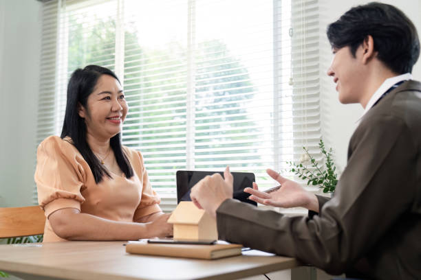 istock Real estate consultation office setting informative interaction professional environment engaging dialogue 2193810647