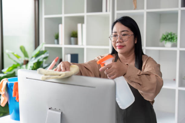 istock Professional maid cleaning a home office urban setting indoor environment close up viewpoint concept of cleanliness 2193812253