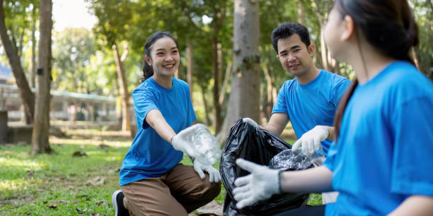 istock Community cleanup event park teamwork activity natural environment outdoor viewpoint environmental awareness 2193812884