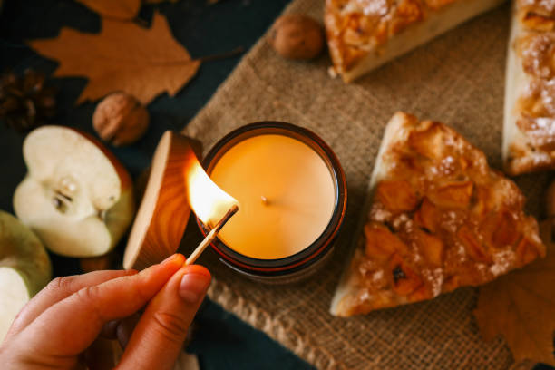 istock Candle and homemade apple pie, autumn mood 2193814955