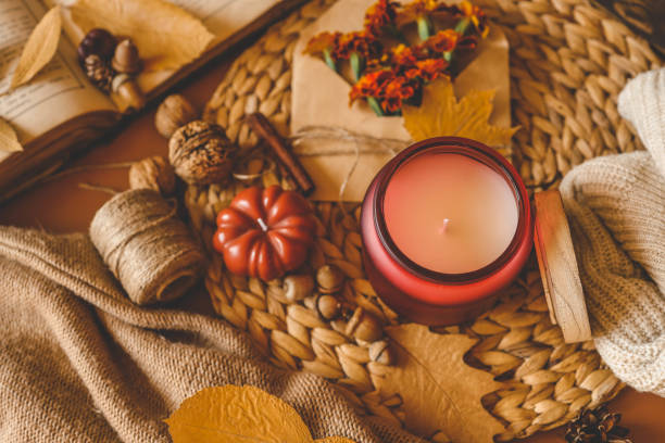 istock Candle in a cozy autumn atmosphere, top view 2193815760