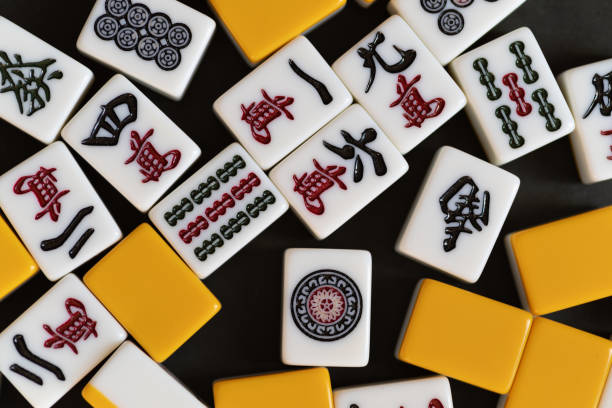 istock Mahjong tiles lined up on a black background 2193816496