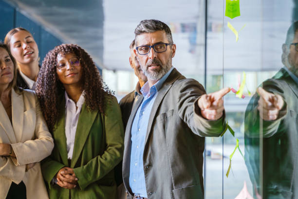 istock Business team brainstorming and planning together 2193821877