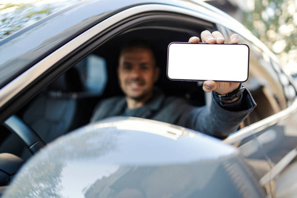 istock Selective focus on hand holding cellphone and showing it at camera. 2193821954
