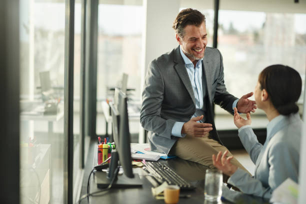 istock Happy diverse entrepreneurs talking while working in the office. 2193824145