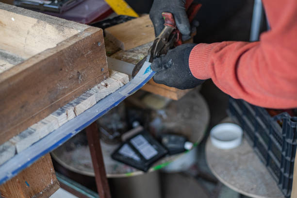 istock A man cuts sheet metal with hand shears 2193824486