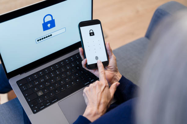 Senior adult using fingerprint scanner on smartphone for secure login