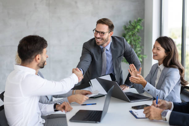istock Handshake in a Positive Business Meeting Setting 2193827981