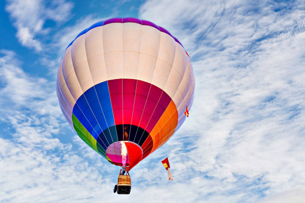 istock Hot air balloon flight over blue sky 2193828011
