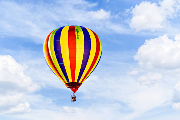 istock Hot air balloon flight over blue sky 2193828217