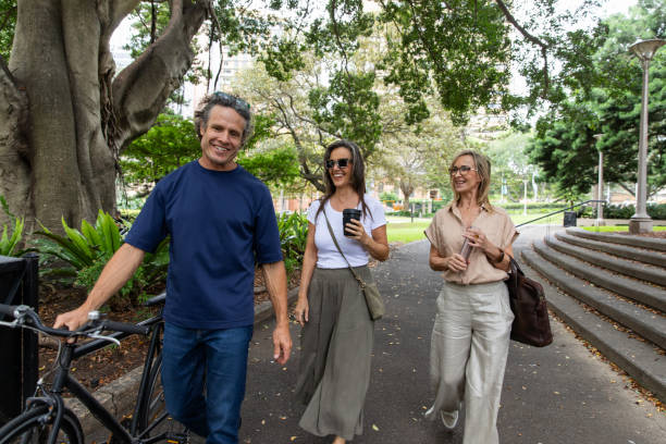 istock Mature aged group commute through the park 2193833774