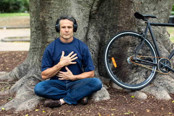 istock Mature aged man takes a mindful break in the park 2193833885