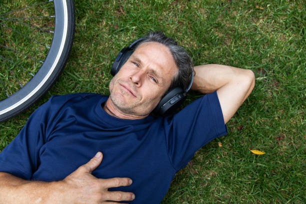 istock Mature aged man takes a mindful break in the park 2193834212