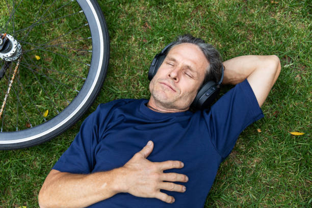 istock Mature aged man takes a mindful break in the park 2193834214