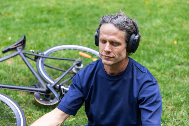 istock Mature aged man takes a mindful break in the park 2193834337