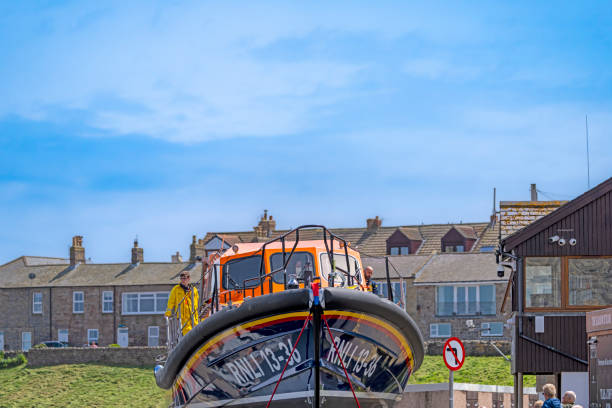 Emergency lifeboat installed on large passenger ferry.