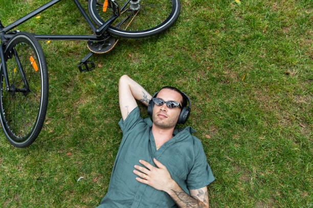 istock Young non-binary adult takes a mindful break in the park 2193836082