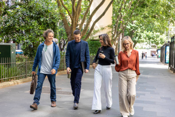 istock Coworkers of mixed age commute on foot 2193836623