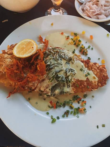 istock Famous Madame Janette almond encrusted grouper 2193840477